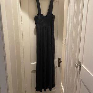 Free People romper in Charcoal. NEVER WORN!